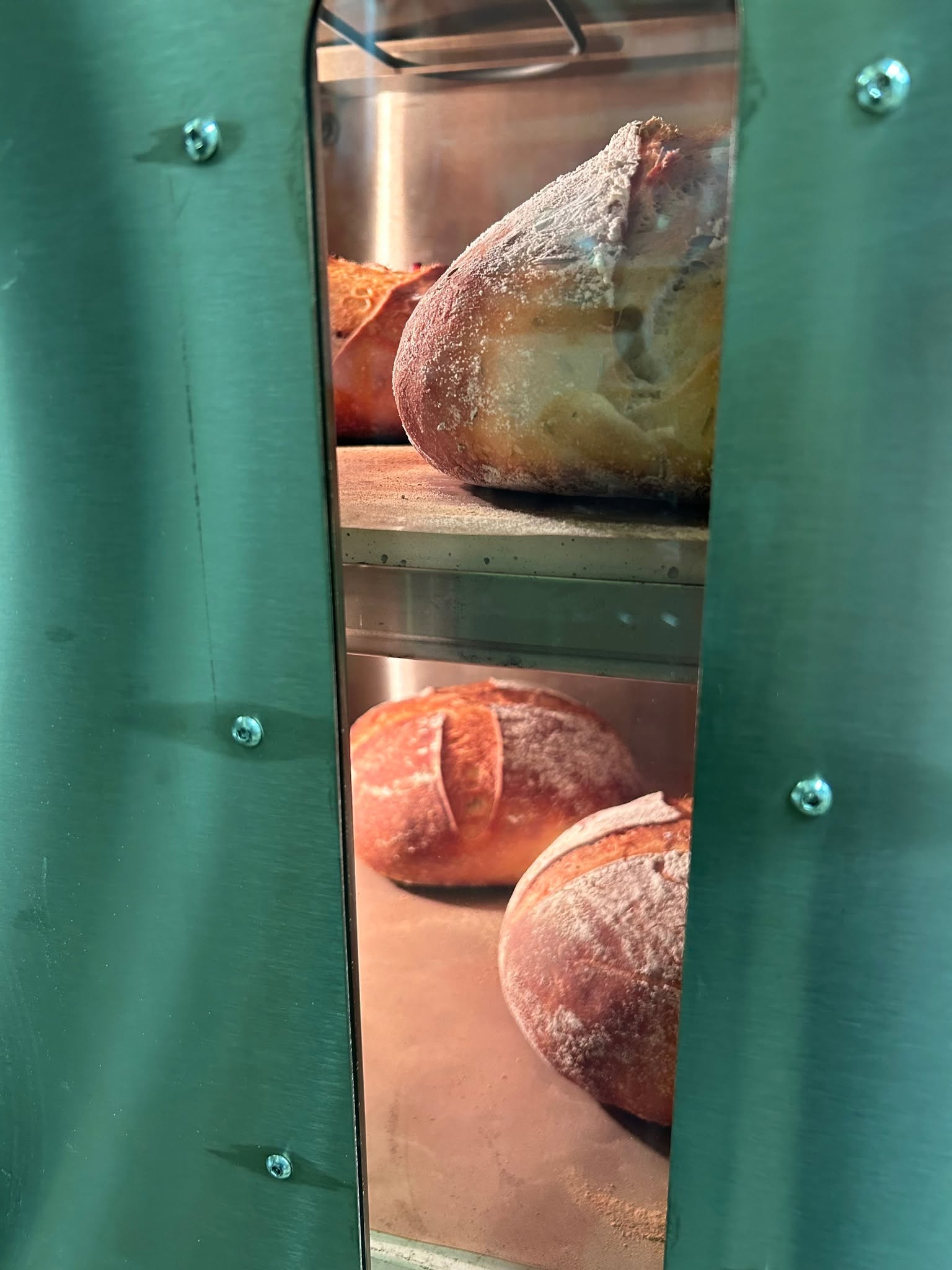 Loaves of sourdough baking in the oven at Bernard Farms